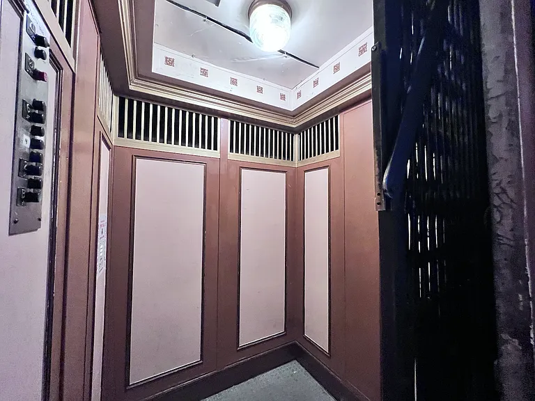 The building has its one and only original historic elevator.