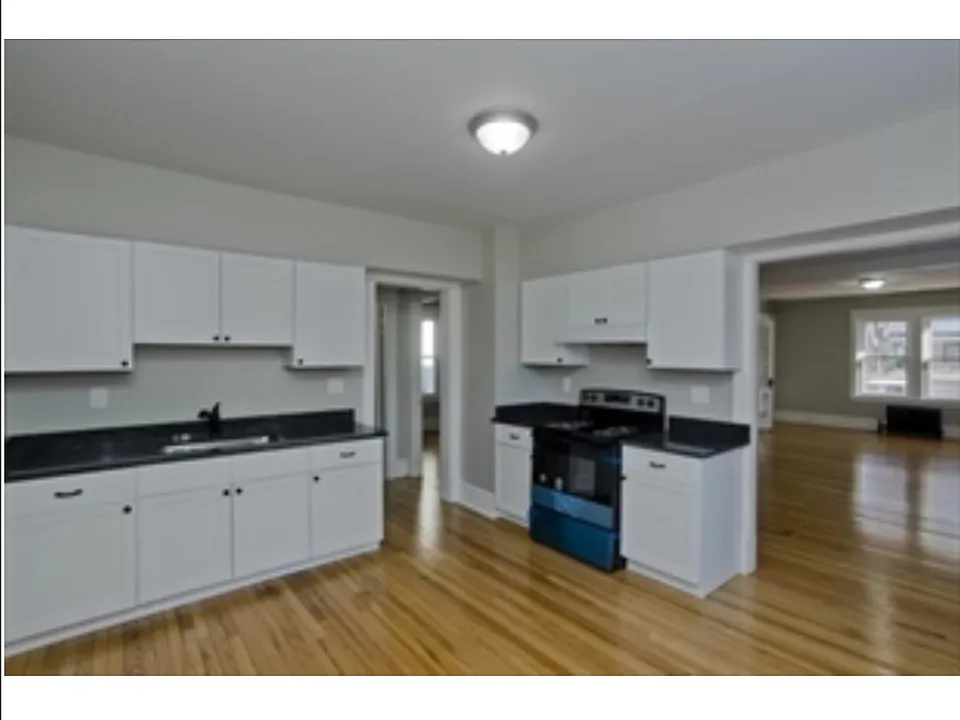 Freshly updated kitchen with granite countertops.