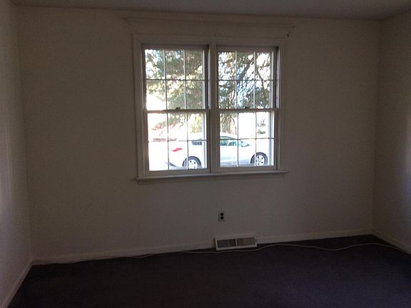 Master bedroom looking at front window.