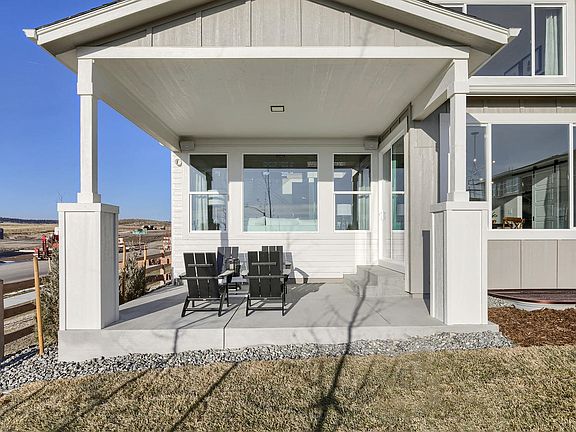 Covered Patio Photo representing home to be built and may demonstrate optional features