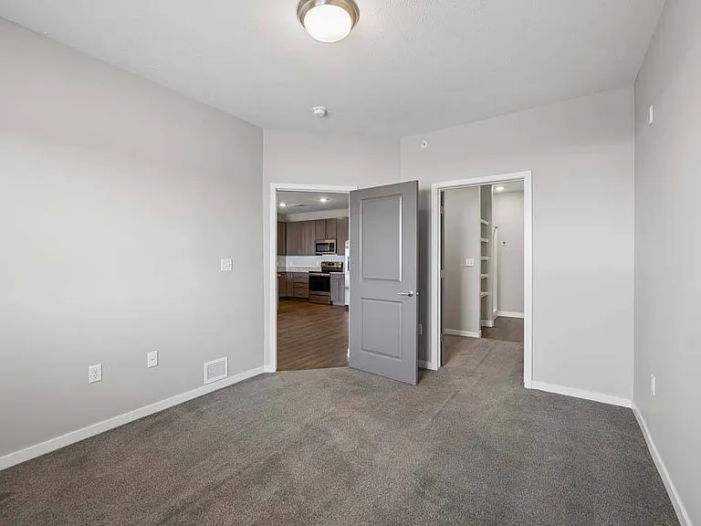 Create a calming retreat with a spacious bedroom designed to offer comfort, flexibility, and a peaceful place to recharge.