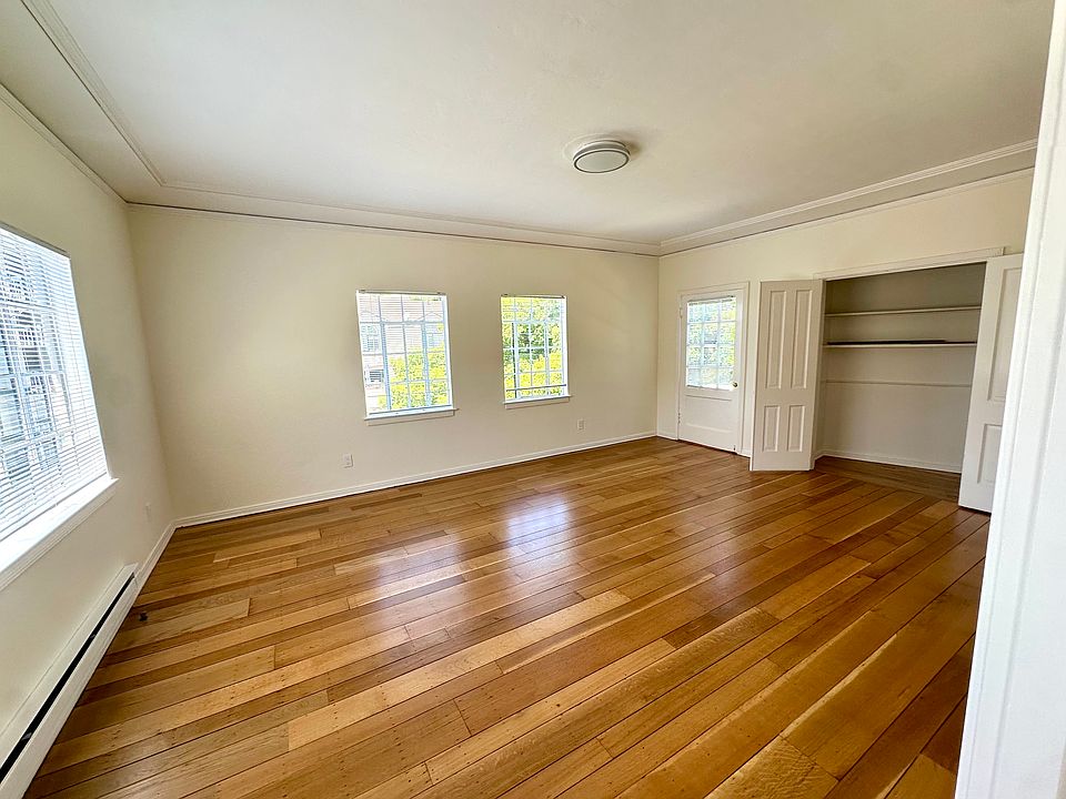 Living room - balcony is off of this room where the door is next to the open closet