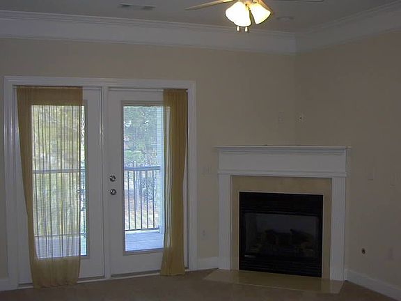 Living Rm w/ Fireplace, Crown Moulding Etc.