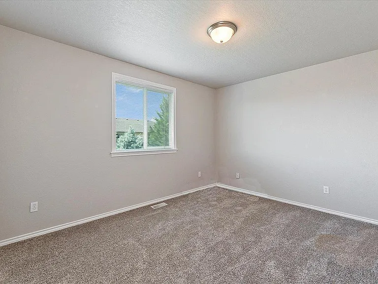 1 of 3 similar upstairs bedrooms