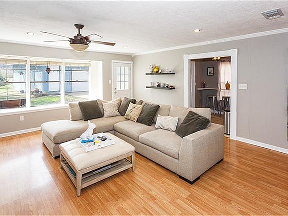 An abundance of natural light.  Crown molding in the Den!