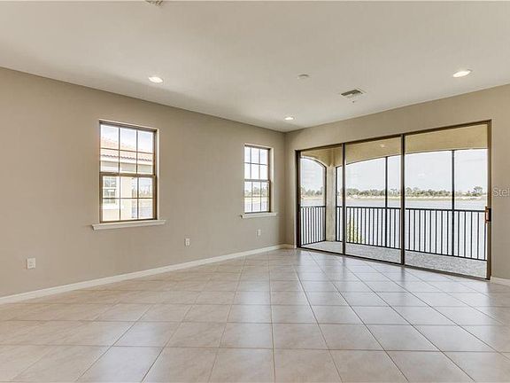 Living area with a screened balcony