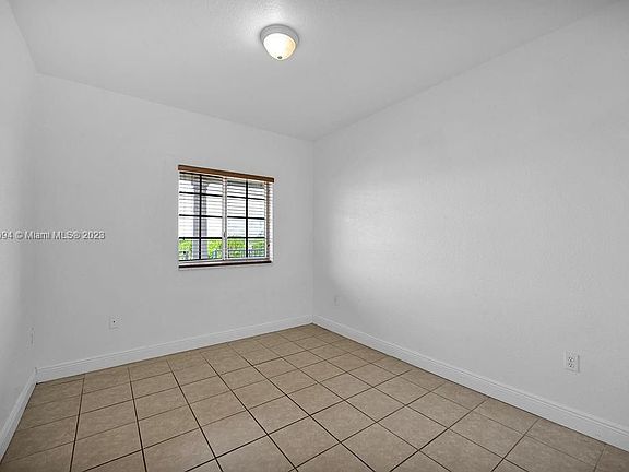 5th image of 6940 NW 179th St APT 402-7