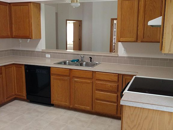Kitchen with pass through to great room