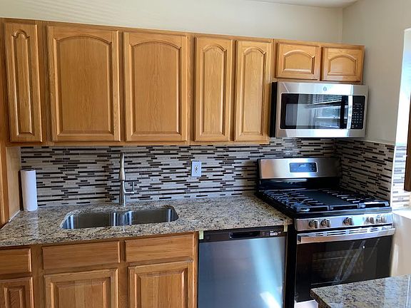 MICROWAVE AND DISHWASHER IN KITCHEN