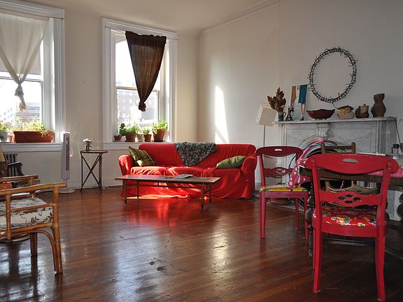Sunny, spacious living room with gorgeous views and ornament