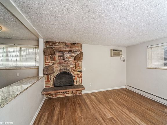 Living room with nice wood-like flooring