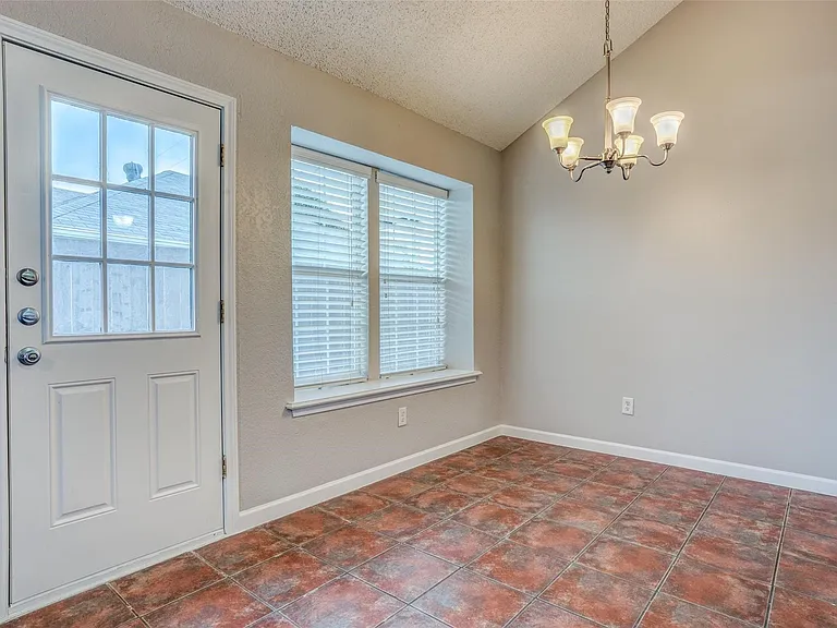 Dining area overlooks patio.