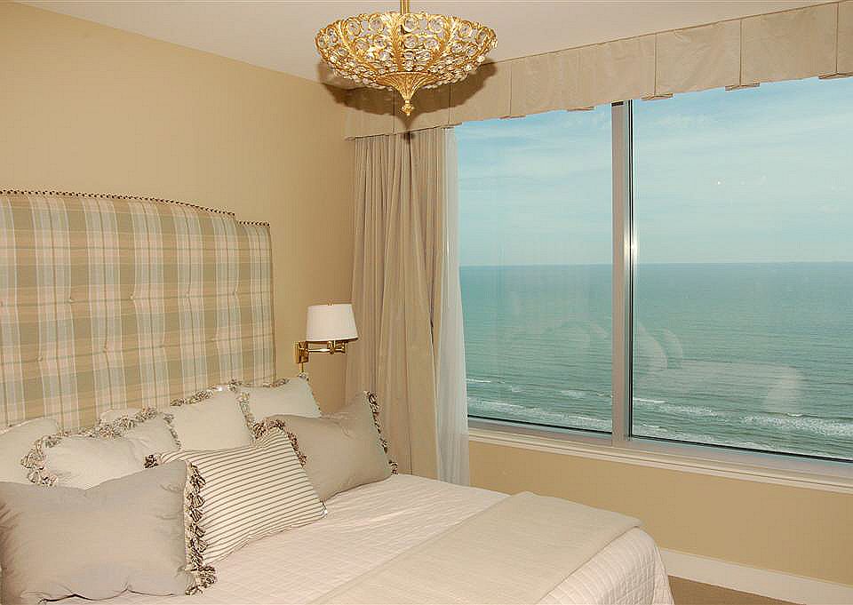 Secondary Bedroom has large windows and can accommodate a King sized bed