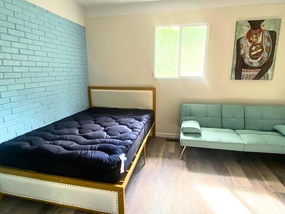 Enjoy a comfy full bed with futon for relaxing