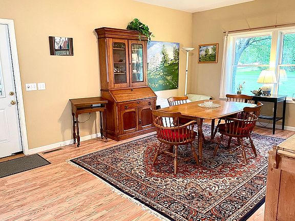 Dining room, garage door @ L