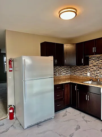 540 Warren Road - 5 — Photo 8