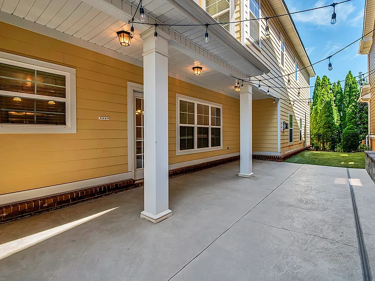 Patio includes overhead and architectural lighting