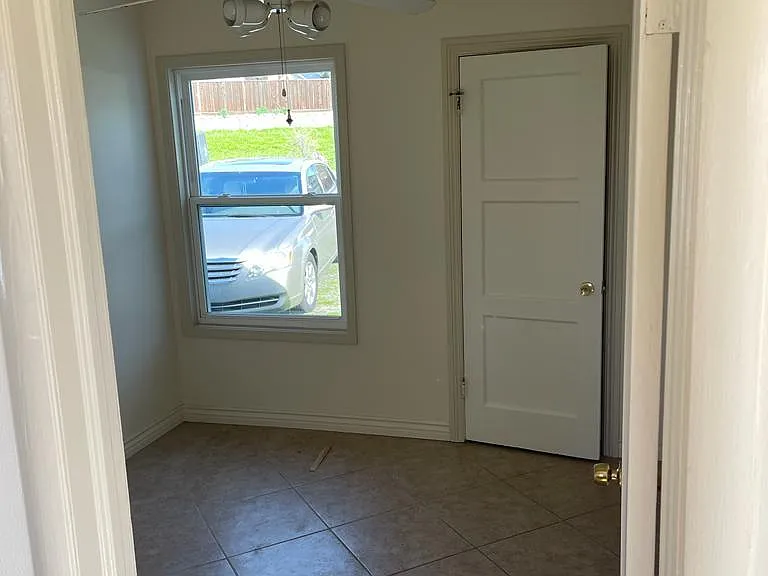 Bedroom entrance with closet in background