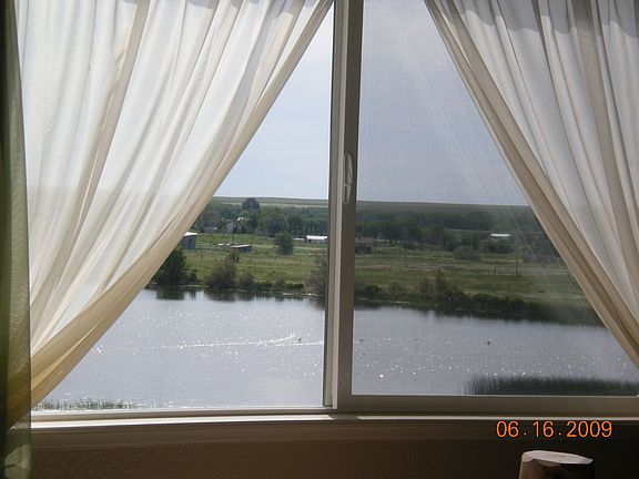 Beautiful view from the Master Bedroom.  At night the moon shines off the Lake