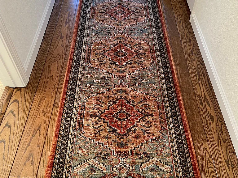 New rug downstairs hallway.