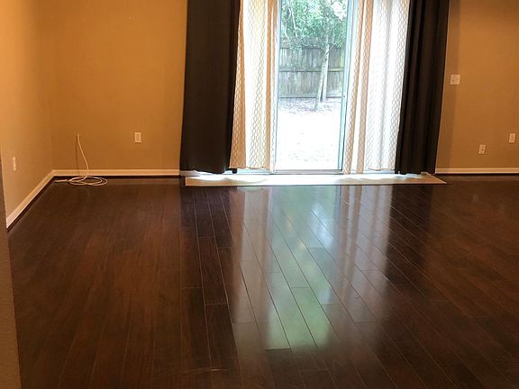 Living room. Conservation behind townhouse so no backyard neighbors.