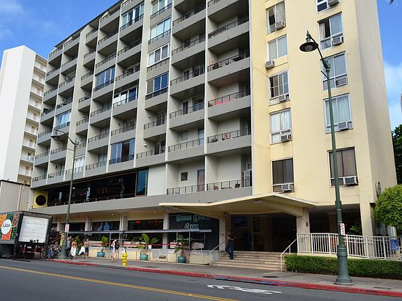 Front view of building from across the street (by the zoo).