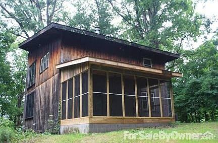 Back
						:
						New screened in back porch with ceiling fan.