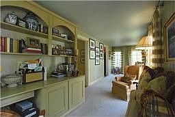 Welcome to the Den or Office! Custom Window treatments! Built-ins with desk an
