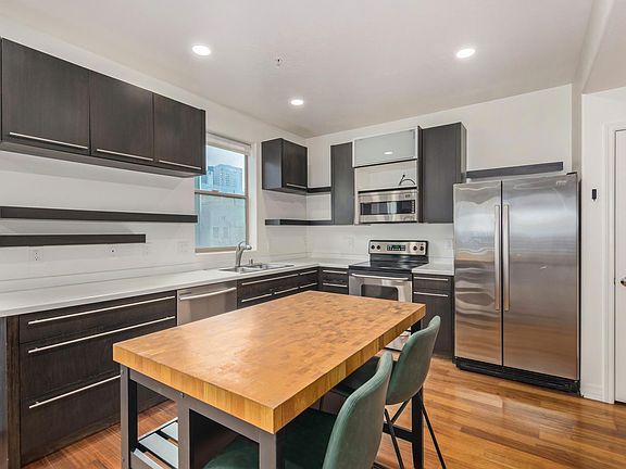 Kitchen island, chairs included if needed