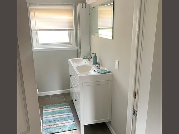 Lots of storage in tall cabinet and sink cabinet.