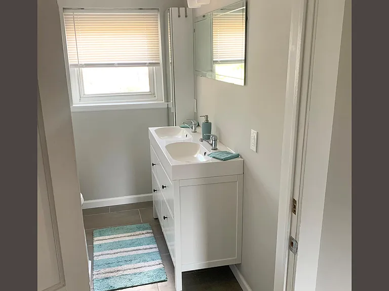 Lots of storage in tall cabinet and sink cabinet.