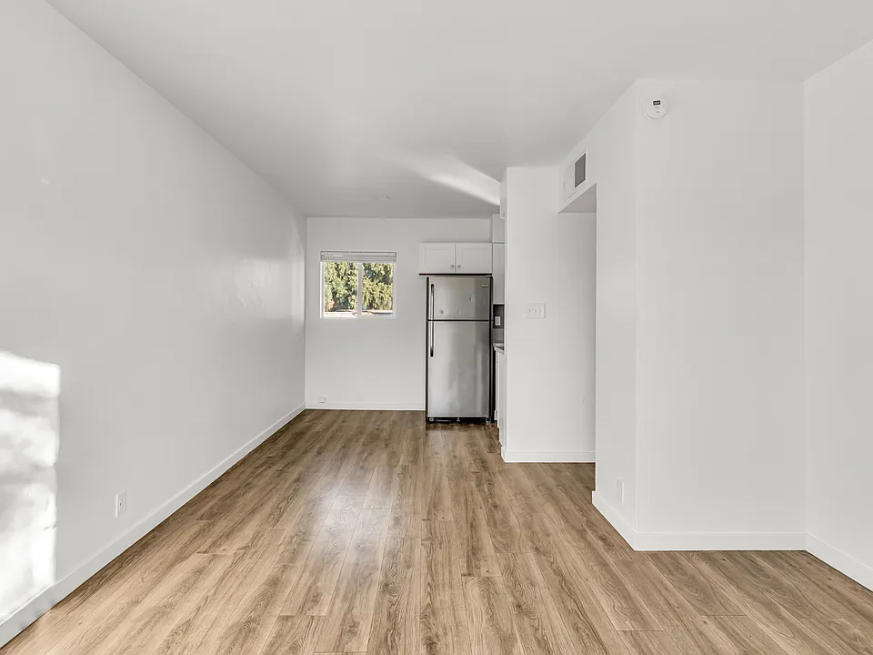 Bright open layout, with vinyl plank flooring throughout.