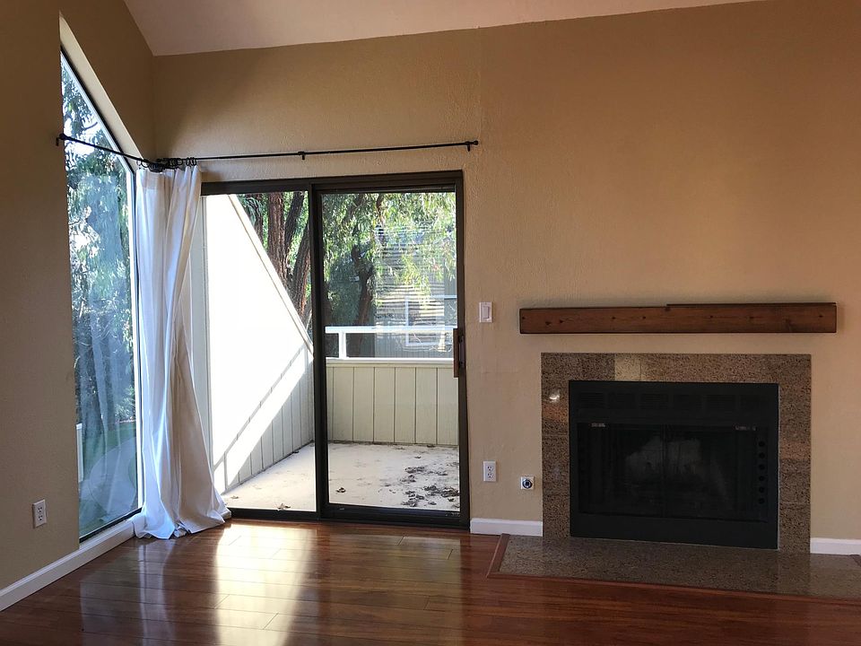 Walking in you see to private balcony and fireplace.