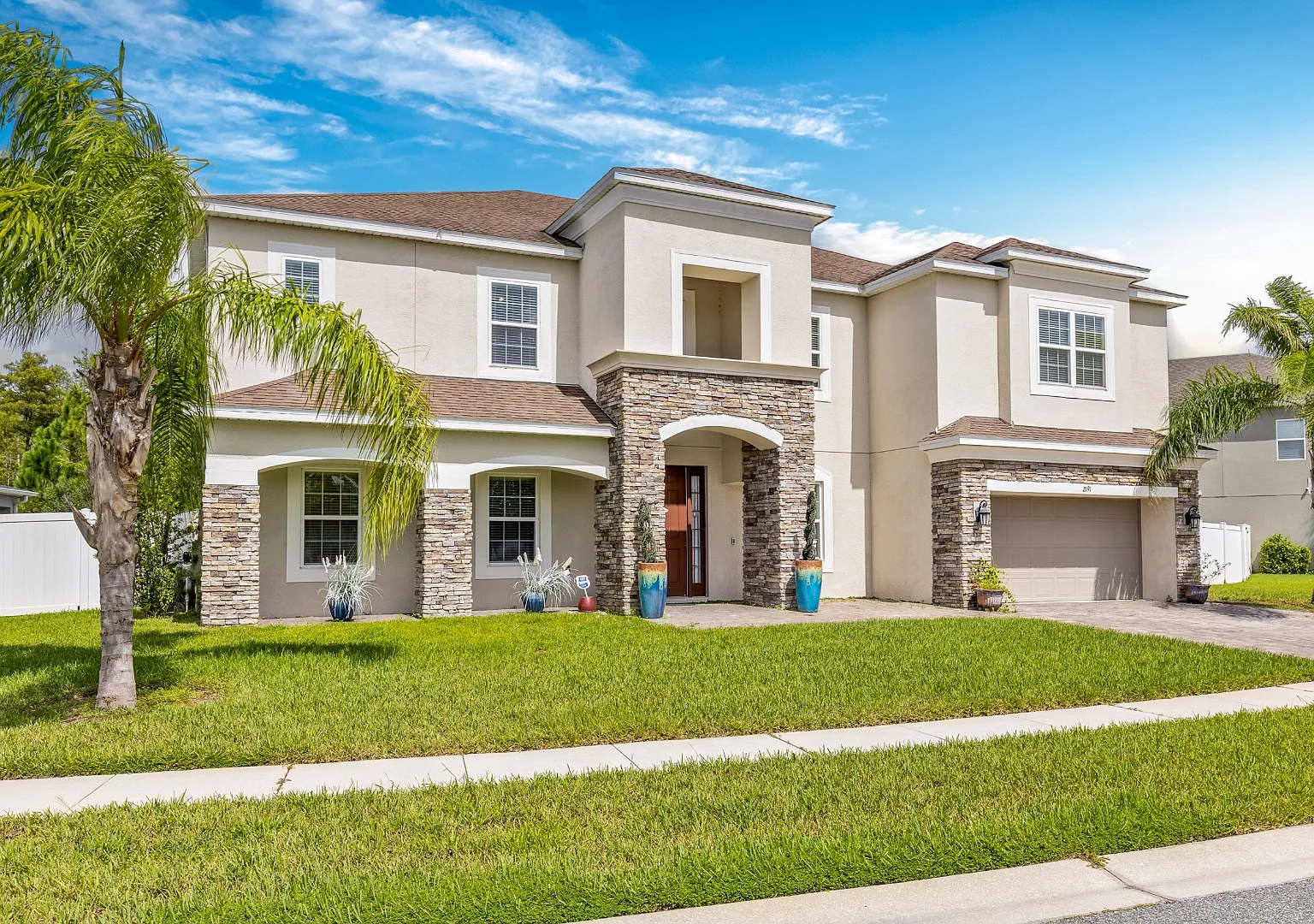 Spacious 6-Bedroom Home Near Lake Nona | 3-Car Garage + Tesla Charger — Photo 1