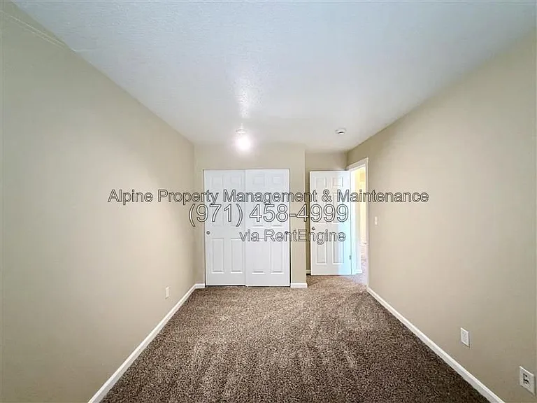 5758 NE Damsel Dr — Photo 24
