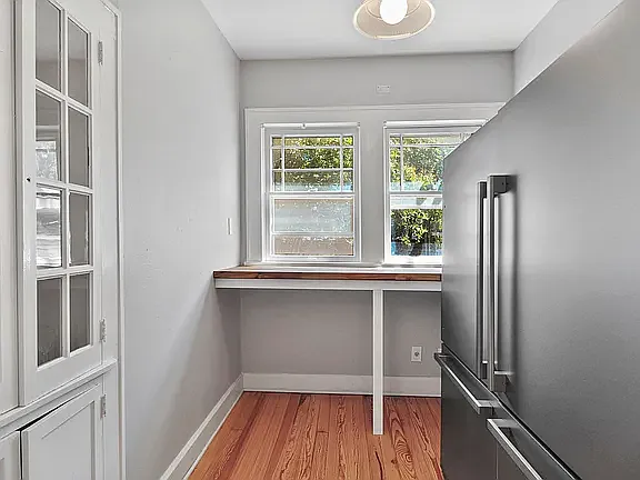 Kitchen nook with 2 full size refrigerators