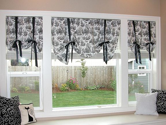 Window seat overlooking backyard