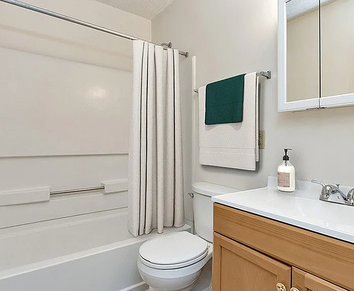 Experience comfort and style in this elegantly designed bathroom.