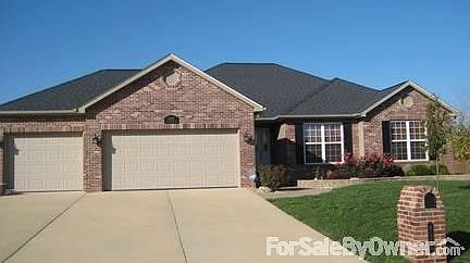 Brick front exterior- 3 car garage
						:
						Brick on the front of the house and vinyl siding on sides and back.