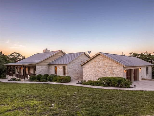 One story custom stone home on private road