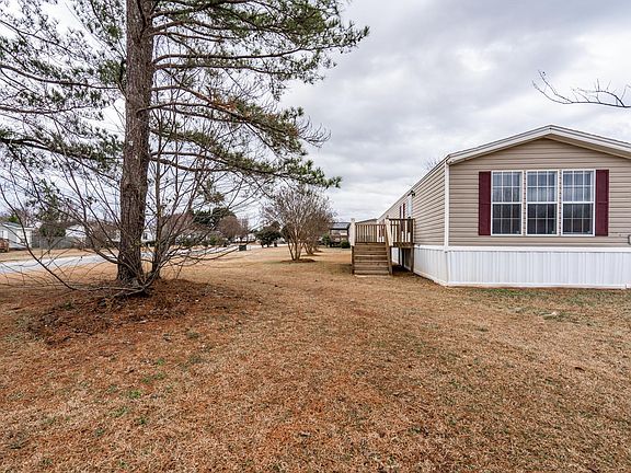 View from side of property by driveway