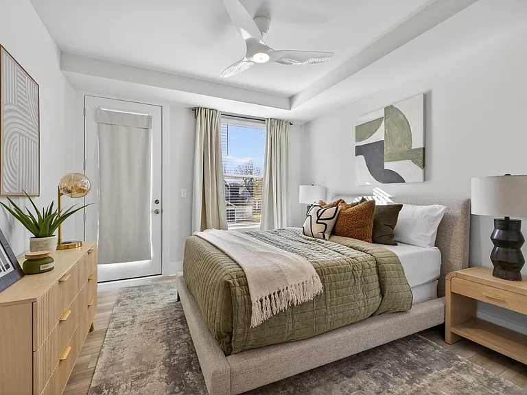 Bedroom 2- queen bed and juliet balcony