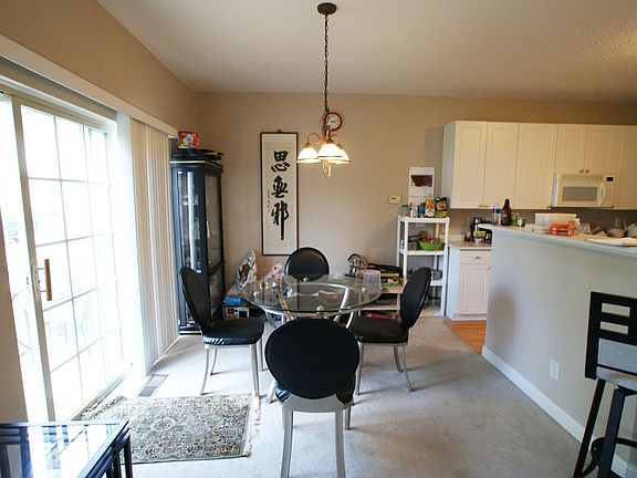 Dining area is bright and open w/access to back patio via sliding glass door.