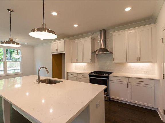 Not actual home photos from same home layout for representation purposes only. The large island is g