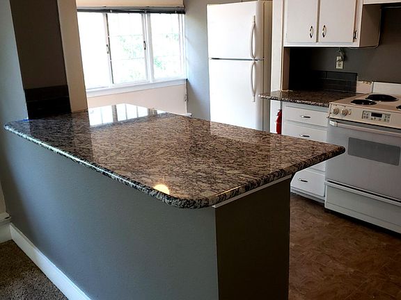 New granite counter tops bar area for two stools kitchen side