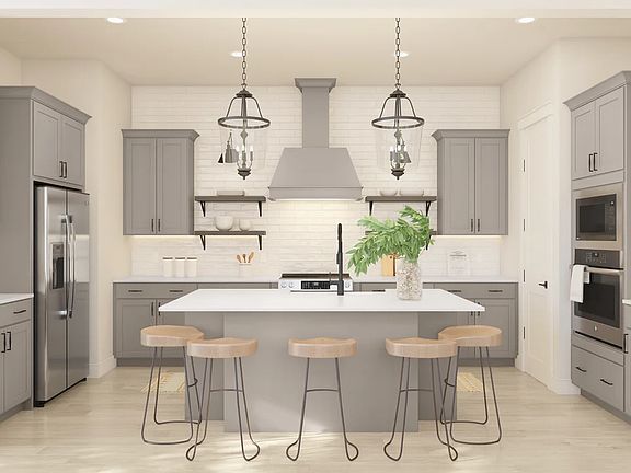 Kitchen with vast island pendant lights