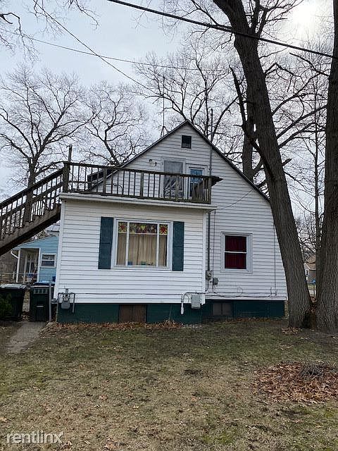 Side of Home Showing Upper Apt.