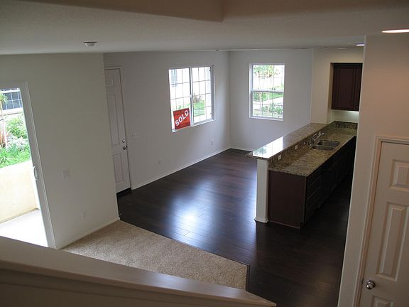 View to dining room from stair landing.