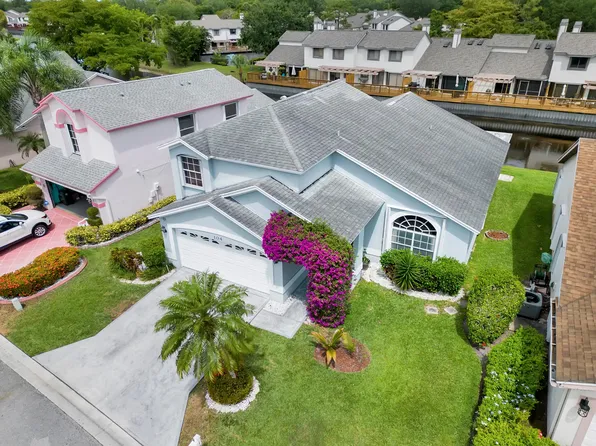 104 Hammocks Court, Greenacres, FL 33413