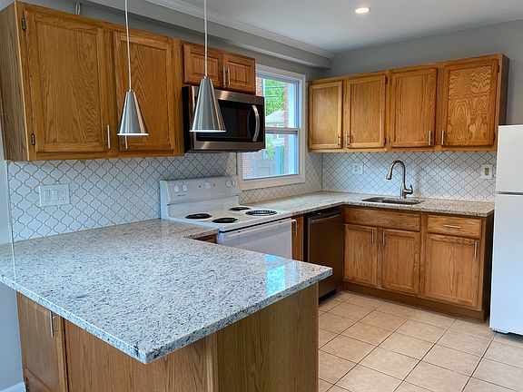 Updated kitchen with new dishwasher, and over the range microwave
